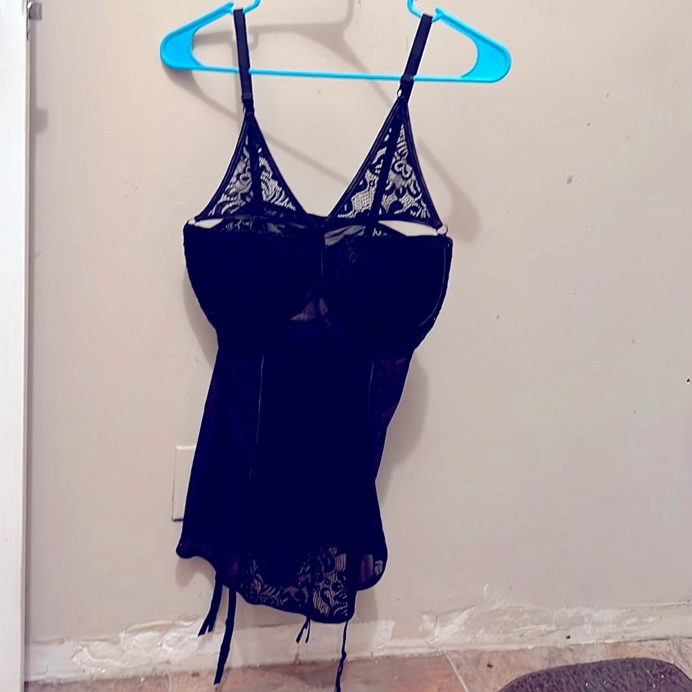Dreamgirl lingerie corset type black with clips to clip to tights.